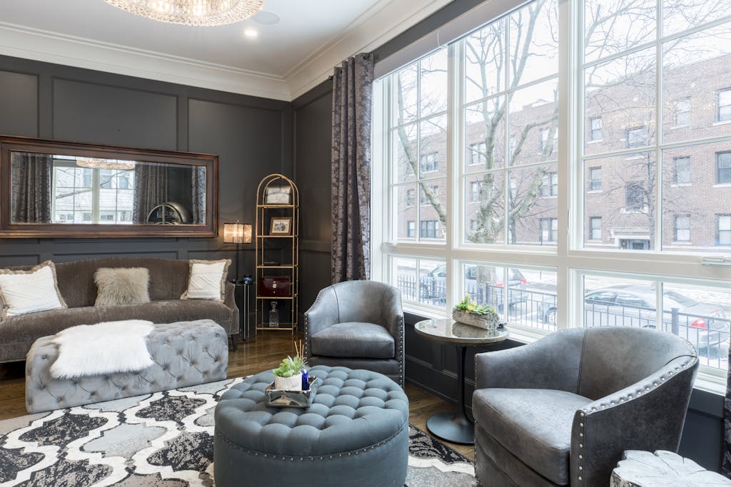 Elegant and spacious living room with modern design and cozy furnishings.